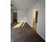 Bedroom with plush carpet leading to a bathroom, and a hall closet at 3292 Underwood Dr, Whiteland, IN 46184