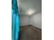 Bedroom with carpeted floor, light walls, and blue curtains partially obscuring the view at 3292 Underwood Dr, Whiteland, IN 46184