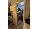 Deep walk-in closet offering plenty of storage with dresser and clothing racks at 3292 Underwood Dr, Whiteland, IN 46184