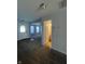 Inviting entryway with brown tiled flooring and a view into the carpeted living area at 3292 Underwood Dr, Whiteland, IN 46184
