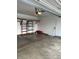 Spacious two-car garage with shelving and ample storage space at 3292 Underwood Dr, Whiteland, IN 46184