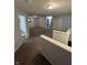 Upstairs hallway featuring carpet floors and multiple rooms at 3292 Underwood Dr, Whiteland, IN 46184