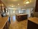 Bright kitchen with stainless steel appliances, a central island, and plenty of cabinet space, creating a functional space at 3292 Underwood Dr, Whiteland, IN 46184