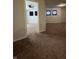 Spacious living room with plush carpet and large windows for ample natural light at 3292 Underwood Dr, Whiteland, IN 46184