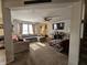 Bright and airy living room with comfortable seating, carpet, and plenty of natural light at 3292 Underwood Dr, Whiteland, IN 46184