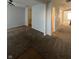 Open-concept living room with neutral walls and plush carpeting throughout the house at 3292 Underwood Dr, Whiteland, IN 46184