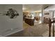 Open-concept living space with kitchen island, dining area, and cozy living room at 3292 Underwood Dr, Whiteland, IN 46184