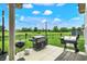 Enjoy grilling in this well-equipped outdoor cooking space overlooking a large backyard and neighborhood at 3592 Gillsland Rd, Bargersville, IN 46106