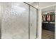 Bathroom with a glass shower stall, silver hardware, and walk-in closet at 3592 Gillsland Rd, Bargersville, IN 46106