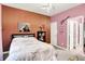 Cozy bedroom featuring a large bed, artwork, and ample natural light, creating a relaxing space at 3592 Gillsland Rd, Bargersville, IN 46106
