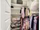 Walk-in closet with ample storage, shelving, rods, and wire baskets, perfect for organization at 3592 Gillsland Rd, Bargersville, IN 46106