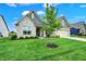 Beautiful single-story house showcases a lush green lawn and well-maintained landscaping at 3592 Gillsland Rd, Bargersville, IN 46106