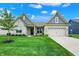 Charming single-story home boasts manicured lawn and stylish brick and siding exterior at 3592 Gillsland Rd, Bargersville, IN 46106