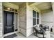Inviting front porch with seating area, perfect for enjoying the outdoors and relaxing at 3592 Gillsland Rd, Bargersville, IN 46106