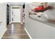 Elegant hallway features sleek flooring, modern paint, and artistic wall decorations at 3592 Gillsland Rd, Bargersville, IN 46106