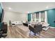Bright and airy living room features designer furniture and neutral color palette at 3592 Gillsland Rd, Bargersville, IN 46106