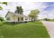 Quaint one-story home with a spacious yard and classic architectural details at 3642 S Mauxferry Rd, Franklin, IN 46131