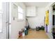 Mud room area featuring a window, storage cabinets, and access to the exterior at 3642 S Mauxferry Rd, Franklin, IN 46131