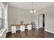 Spacious dining room with a view of the backyard, complemented by a butcher block countertop workspace at 3832 Boundary Bay Dr, Indianapolis, IN 46217