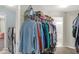 Organized walk-in closet featuring shelving, hanging racks, and carpeted floors offering storage space at 3832 Boundary Bay Dr, Indianapolis, IN 46217