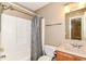 Bathroom featuring a shower with a curtain, a vanity with a mirror, and neutral walls at 3839 Churchman Woods Blvd, Indianapolis, IN 46203