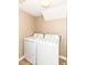 The dedicated laundry room features a washer and dryer for convenient laundry care at 3839 Churchman Woods Blvd, Indianapolis, IN 46203