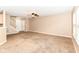 Open-concept living room flows into the kitchen with a breakfast bar and updated appliances at 3839 Churchman Woods Blvd, Indianapolis, IN 46203
