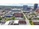 Picturesque aerial view featuring the cityscape, residential homes, and clear blue skies at 404 E New York E St # 406, Indianapolis, IN 46202