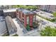 Apartment building with brick facade, balconies, and meticulously landscaped grounds at 404 E New York E St # 406, Indianapolis, IN 46202