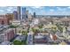 City aerial view with notable buildings, streets, and urban green spaces at 404 E New York E St # 406, Indianapolis, IN 46202