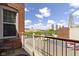View from the balcony of the surrounding area, including a nearby church at 404 E New York E St # 406, Indianapolis, IN 46202