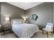 Comfortable bedroom with stylish decor featuring a decorative wreath and soft, neutral colors at 404 E New York E St # 406, Indianapolis, IN 46202