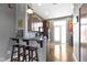 Stylish kitchen with dark cabinets, stone countertops, and stainless steel appliances at 404 E New York E St # 406, Indianapolis, IN 46202