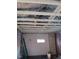 Basement with exposed beams, small window, and a ladder, ready for customization at 4106 N Pasadena Ave, Indianapolis, IN 46226