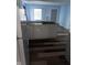 Spacious kitchen featuring a center island sink and contrasting hardwood flooring at 4106 N Pasadena Ave, Indianapolis, IN 46226