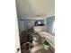 Open living area showcasing new floors, and kitchen renovation progress with modern design and lighting at 4106 N Pasadena Ave, Indianapolis, IN 46226