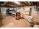 Basement with painted walls, concrete floor, storage area and a window for natural light at 4163 Otterbein Ave, Indianapolis, IN 46227