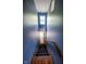 Stairway with carpeted steps and blue walls at 4163 Otterbein Ave, Indianapolis, IN 46227