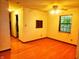 Bedroom with hardwood floors and natural light at 4336 Abby Creek Ln, Indianapolis, IN 46205