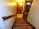 View of the entryway featuring a staircase and front door with traditional design elements at 4336 Abby Creek Ln, Indianapolis, IN 46205