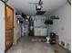 Unfinished garage features laundry, shelving, and access door to the main house at 4336 Abby Creek Ln, Indianapolis, IN 46205