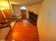 Spacious living room with hardwood floors, fireplace, and ceiling fan at 4336 Abby Creek Ln, Indianapolis, IN 46205