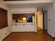 Open-concept living room featuring a bar-height counter overlooking the kitchen at 4336 Abby Creek Ln, Indianapolis, IN 46205