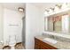 Compact bathroom with granite vanity, shower and tile floors at 4504 Harvard Dr, Anderson, IN 46013