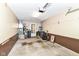 Large garage has a utility sink, hot water heater, shelving and ample storage space at 4504 Harvard Dr, Anderson, IN 46013