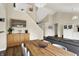 Open-concept dining area featuring a wooden table and modern seating at 482 Sycamore St, Brownsburg, IN 46112