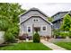 Backyard featuring stylish furniture, a wooden deck, and lots of greenery at 5015 N Park Ave, Indianapolis, IN 46205