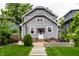 Backyard featuring stylish furniture, a wooden deck, and lots of greenery at 5015 N Park Ave, Indianapolis, IN 46205