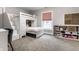 Charming bedroom featuring a bunk bed with stairs and built-in storage, maximizing space and functionality at 5015 N Park Ave, Indianapolis, IN 46205
