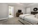 Spacious bedroom with ensuite bathroom and a modern dresser, offering ample storage at 5015 N Park Ave, Indianapolis, IN 46205